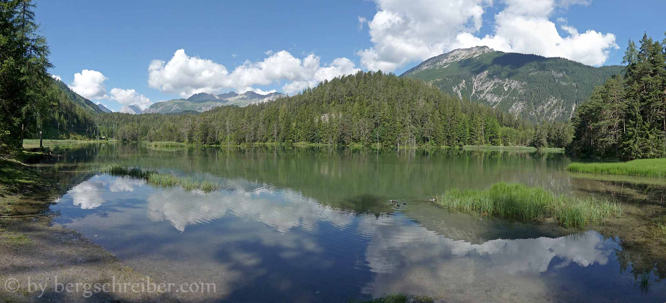 Weissensee darüber die Gartnerwand und der Grubigstein